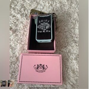 Juicy Couture case with charm